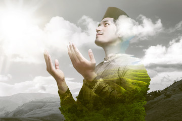 Religious asian muslim praying to god