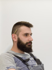 Obraz premium portrait of bearded hipster handyman