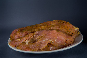 raw meat fillet pickled in spices and herbs