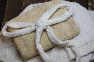 Obraz na płótnie Canvas Terry bathrobe and bath slippers