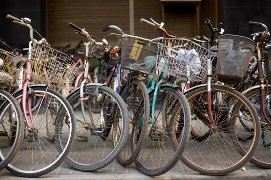 Bicycles at a parking zone in downtown Shanghai, China, Asia