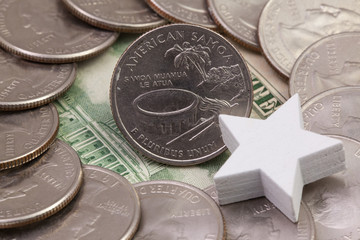 A quarter of American Samoa, quarters of USA and white star.