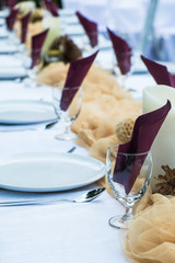 Water glasses prepared with napkins for dinning party