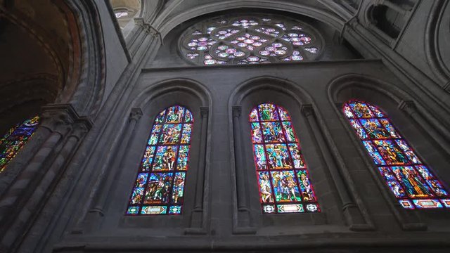 Beautiful Medieval stained glass rosace Cathedral. Cinematic camera movement - discovering this impressive work of art