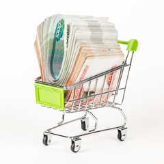 Food trolley, full of Russian 5000 banknotes. On a white background.