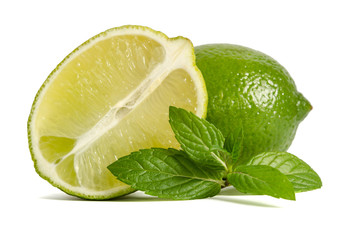  one lime with half of a juicy lime with leaves of mint isolated on white background
