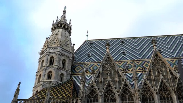 a tilt down side view of st stephen's cathedral in vienna, austria