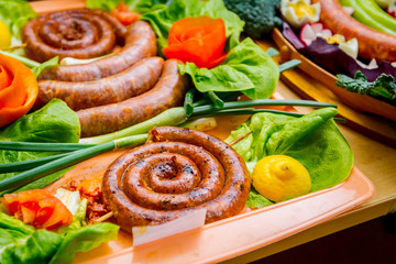 Traditional sausages are arranged for review at food contest