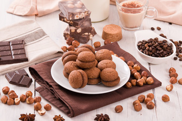 Hazelnut shortbread sandwiches filled with chocolate cream.