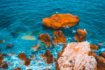 beautiful orange cliffs and water