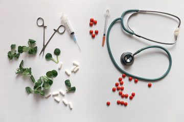 Herbal medicine vs chemical medicine the alternative healthy care on white background