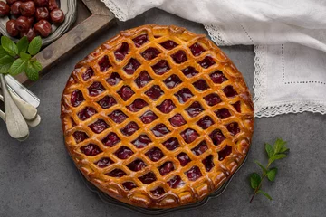 Zelfklevend Fotobehang Dessert Homemade open sour cherry pie, delicious sweet dessert