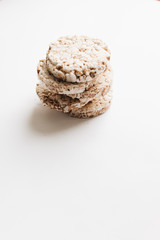Crisp bread slices isolated over white background, healthy breakfast