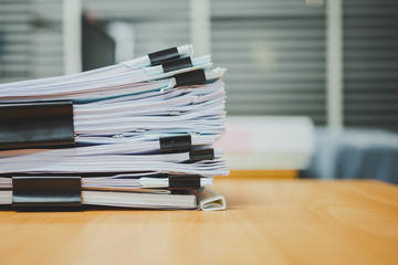 Stack of documents on the desk