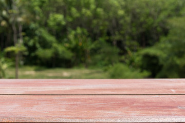 Fototapeta premium Wooden table with nature background