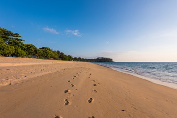 beach sand with footprint near sea in Thailand