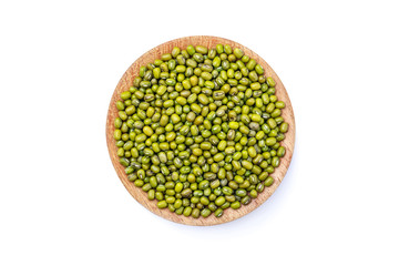 Mungbean in the wooden plate  isolated on white background with clipping path. top view.