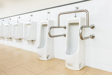 White Porcelain Urinals for Cripple and Old People in Public Toilet, Exterior of toilet  for disabled