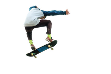 A teenager skateboarder jumps an ollie on an isolated white background. The concept of street...