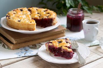 A traditional American or European cherry pie made of shortcake. Rustic style.