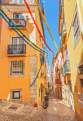 Old Historic center of Lisbon decorated for festival. Alfama district in Lisbon, Portugal.