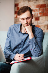 Young man with a laptop