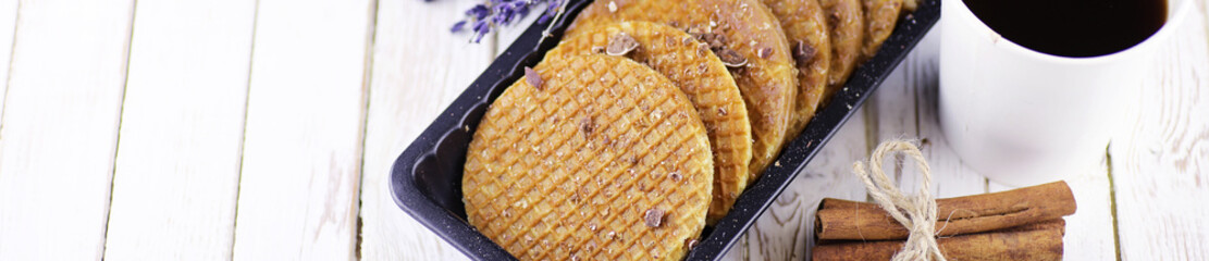 Horizontal panorama bakground of viennese wafers with caramel