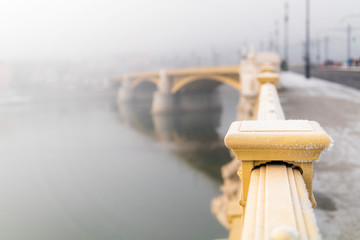 Detail of Margaret Bridge (Margit hid) in the fog, Budapest, Hungary