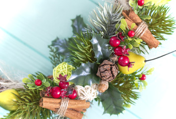 Christmas wreath on a wooden background. Holidays