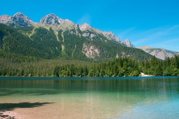 autumnal view of the Tovel Lake, Trentino Italy.