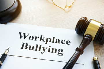 Documents about Workplace bullying in a court. - obrazy, fototapety, plakaty