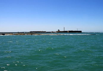 Fototapeta premium Fortress of San Sebastian on the shores of the ancient maritime city of Cadiz.