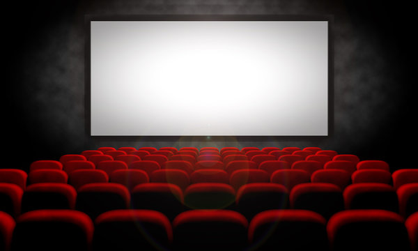 white screen and red seats in empty movie theater