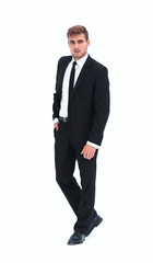 portrait in full length of serious young businessman.