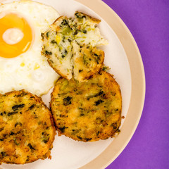 Cooked Vegetarian Bubble And Squeak Cakes With A Fried Egg