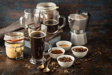 Coffee with coffee beans, ground coffee and brown sugar