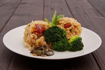 Rice risotto with vegetables on a table