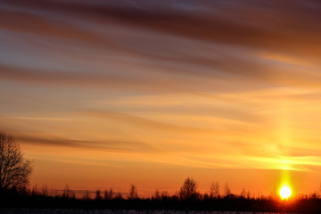 Layered clouds at sunset.