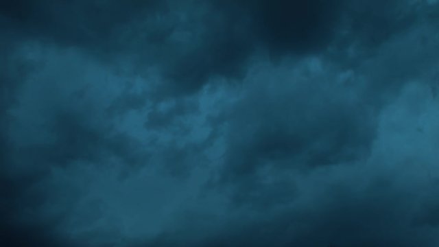 Part Two of an extended clip of a sky full of dark storm clouds rolling in fast from another vantage point