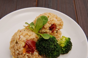 Rice risotto with vegetables on a table