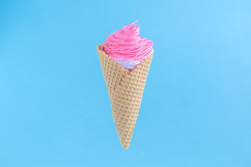 Ice cream made of pink and white threads. Summer creative minimal concept.