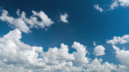 Wonderful white cumulus clouds on blue sky