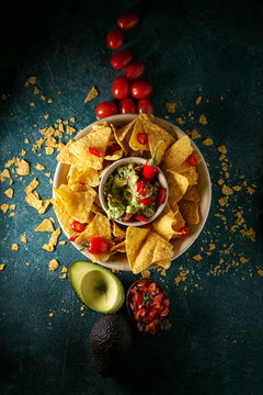 Mexican nachos served with guacamole