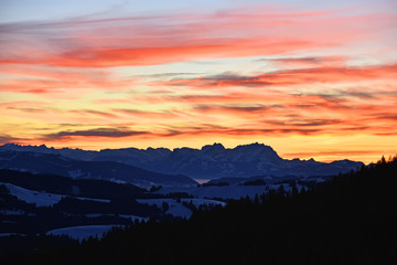 Colorful sunset on a cold winter day at the Saentis mountain, Switzerland