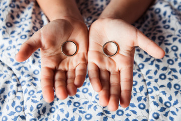 Hands and wedding rings