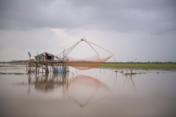 Fototapeta premium Fishnets on sunset. Fort Kochin, Kochi, Kerala, India