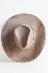 Brown cowboy hat use in farm