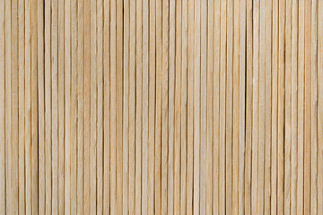 Texture of wood made of ice cream sticks. Side view.