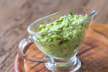 Guacamole in glass gravy-boat