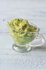Guacamole in glass gravy-boat